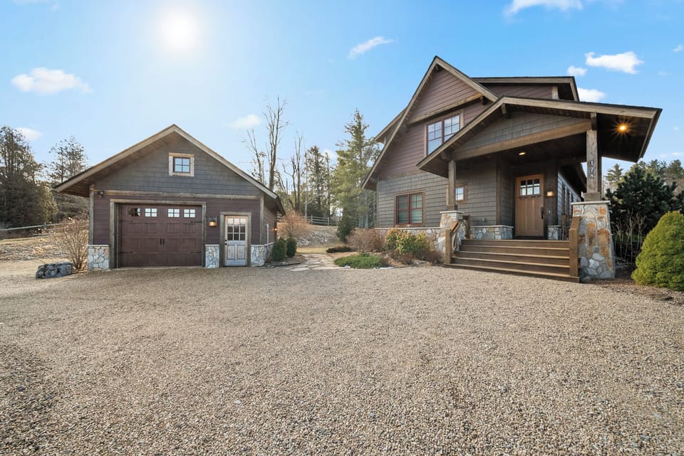 Gravel Parking with Main House and Detached Garage