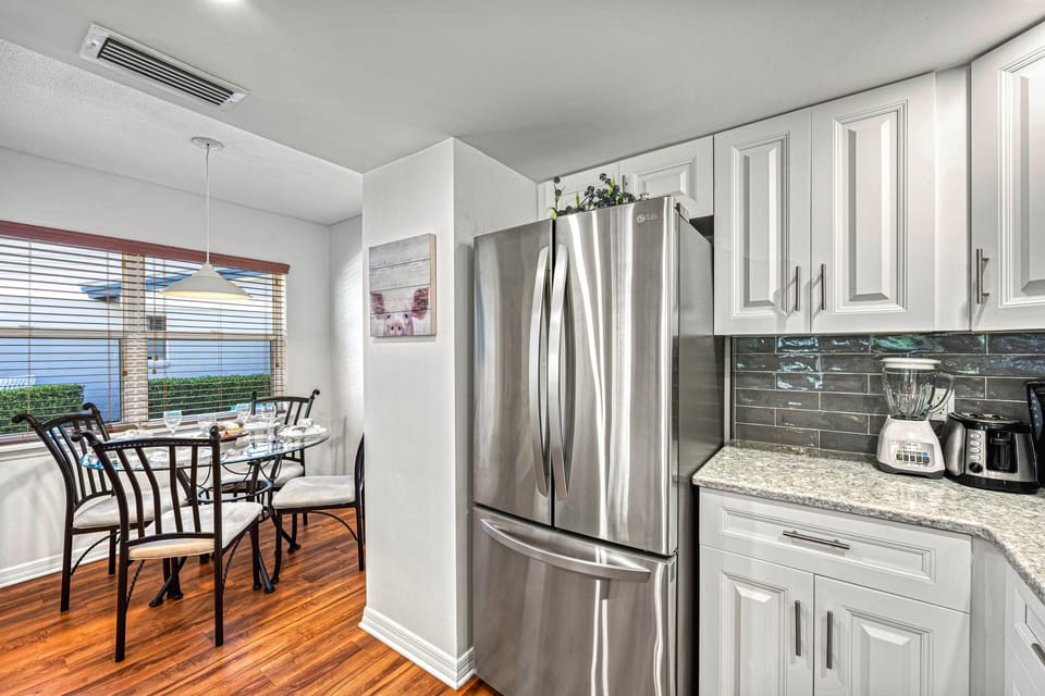 The dining area flows into the kitchen space easily.