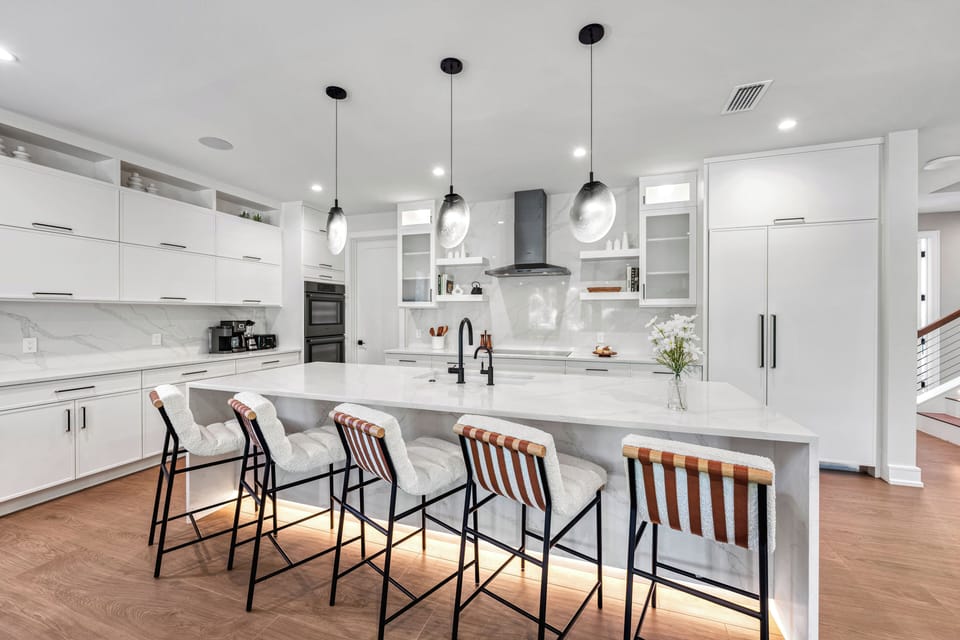 Gather around the island for coffee, snacks, or evening conversations.