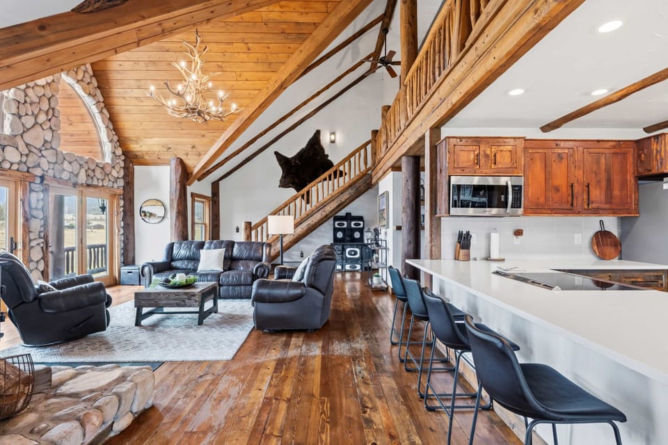 Main Cabin: Kitchen and Living area with seating at the island as well. 