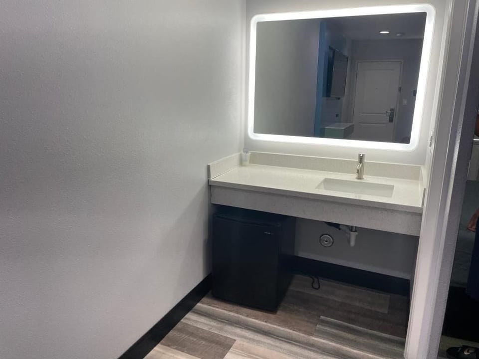 Room, 2 Queen Beds | Bathroom | Shower, free toiletries, hair dryer, towels