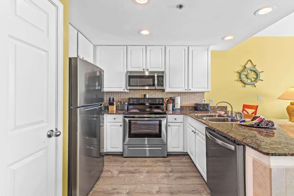 Enjoy the company of family or friends while preparing a meal in our kitchen, equipped with new stainless steel appliances.