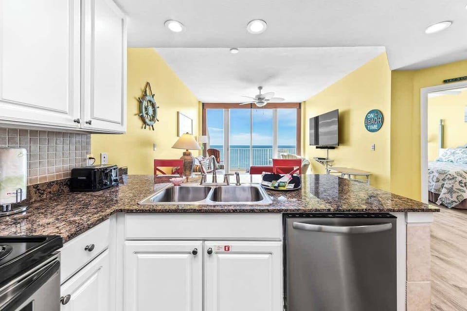 Pour your favorite drink to bring out onto the balcony to take in immaculate sunset views.