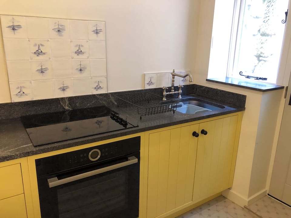 Well equipped, galley style kitchen | The Anchorage, Staithes, near Whitby