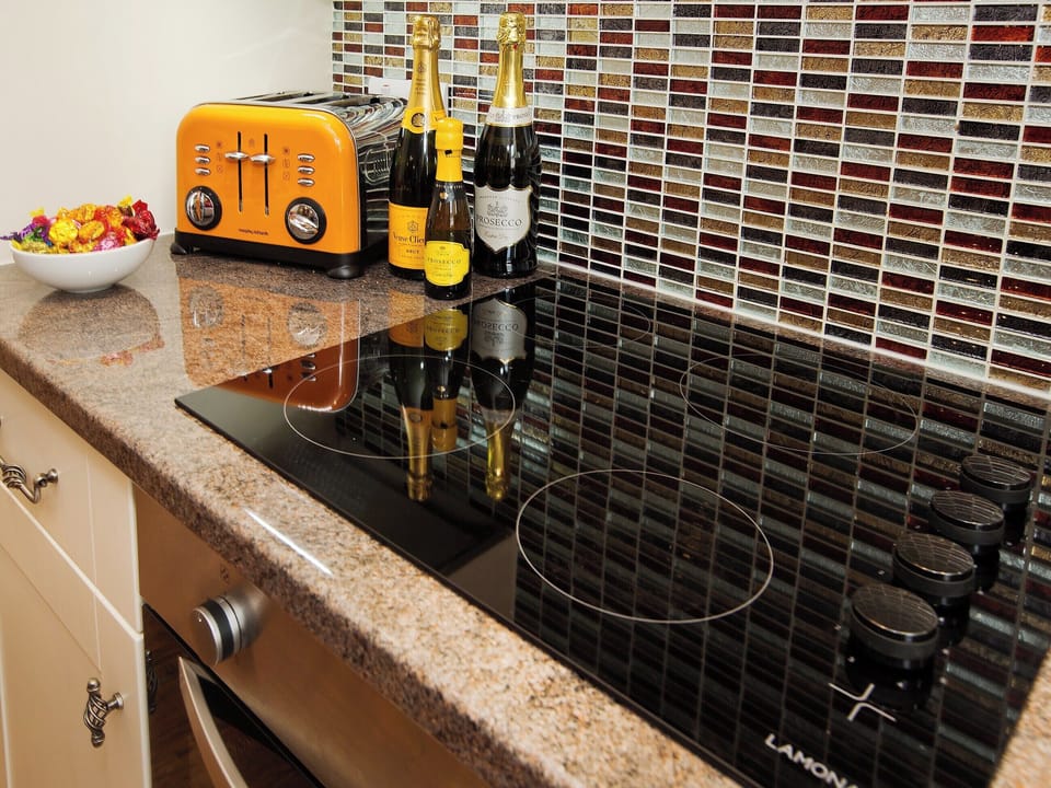 The kitchen is equipped with stylish appliances and accessories | 22 Rose Terrace, Keswick