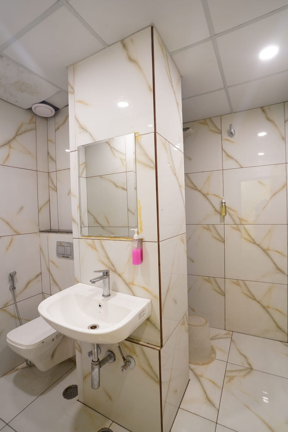 Shower, towels, soap, shampoo