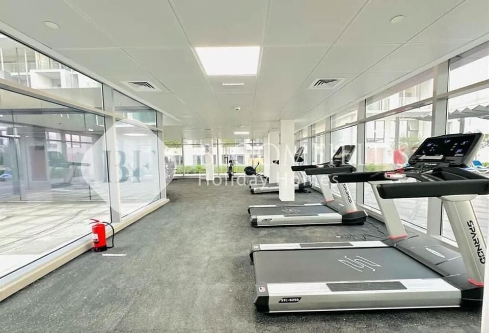 Apartment, Balcony | Fitness facility