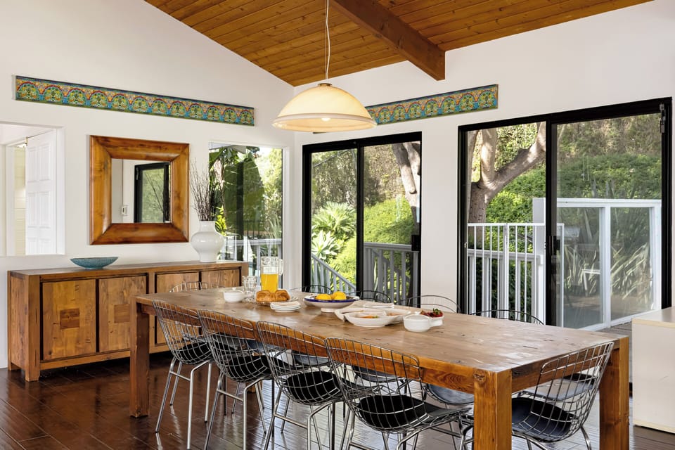 A welcoming dining space with direct access to the outdoor deck.
