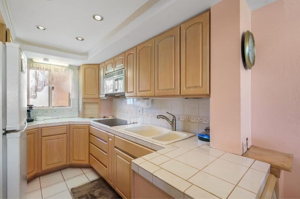 Condo, 2 Bedrooms | Private kitchen | Coffee/tea maker, fridge, oven, toaster