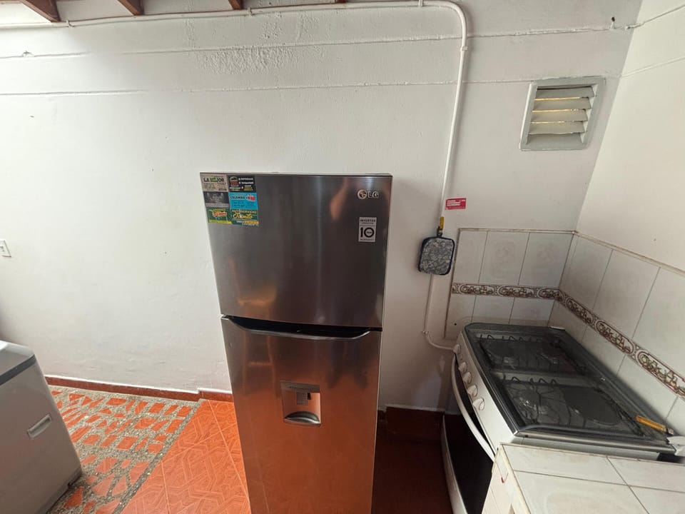 Family Apartment, Partial Lake View | Private kitchenette | Microwave