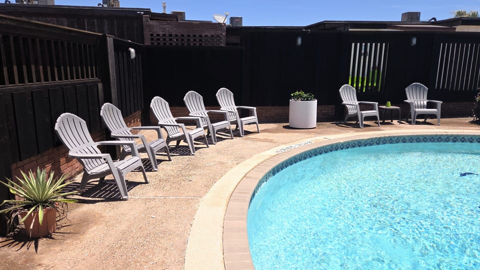 The pool area has plenty of seating.
