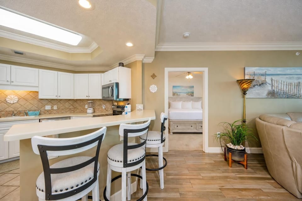 Gather with loved ones at the stylish breakfast bar, sharing laughs and leisure in this inviting space