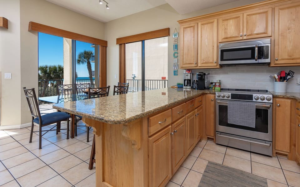 Craft delicious family meals in this inviting kitchen and feel at home on vacation