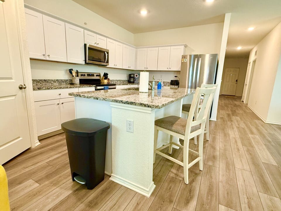 Create unforgettable meals in this beautifully designed, fully equipped kitchen. Gather your group to savor delightful dining experiences in the elegant dining area.
