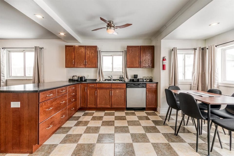 Savor the ease of a fully equipped kitchen where home-cooked meals come together effortlessly. The open layout ensures the chef is always part of the conversation, making every morning coffee or dinner feel like a special occasion.