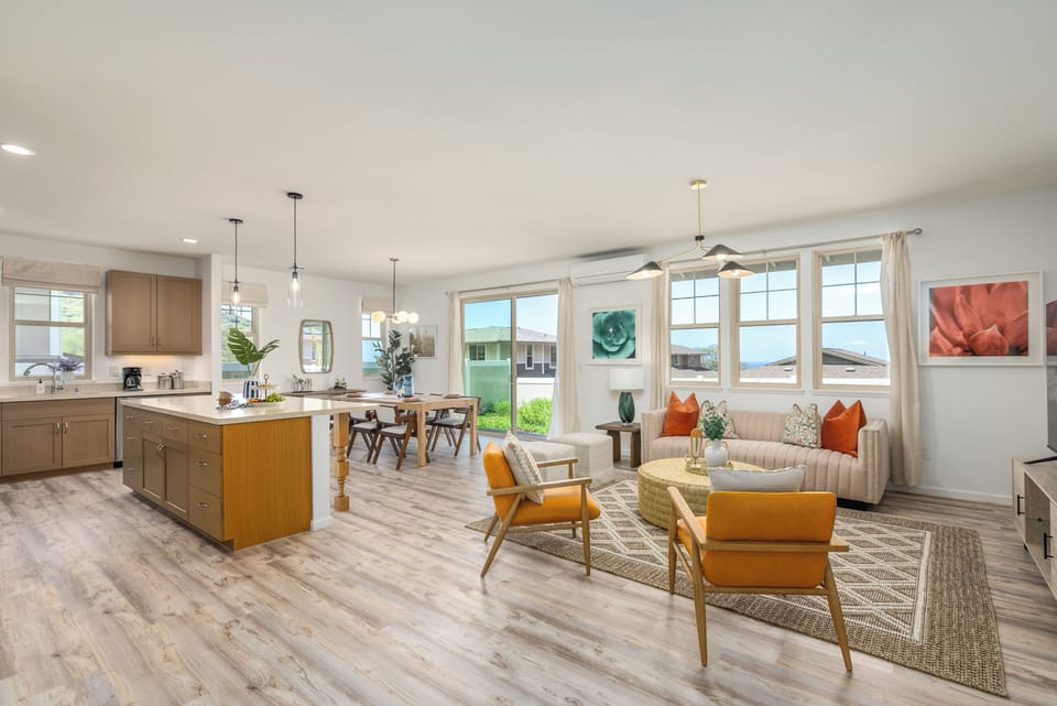 The open floor plan tastefully integrated with the large, luxurious kitchen.