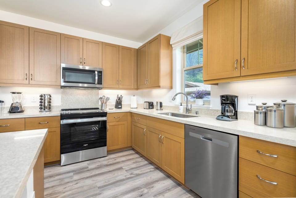 High-end appliances and a deep basin sink simplify cleanup.