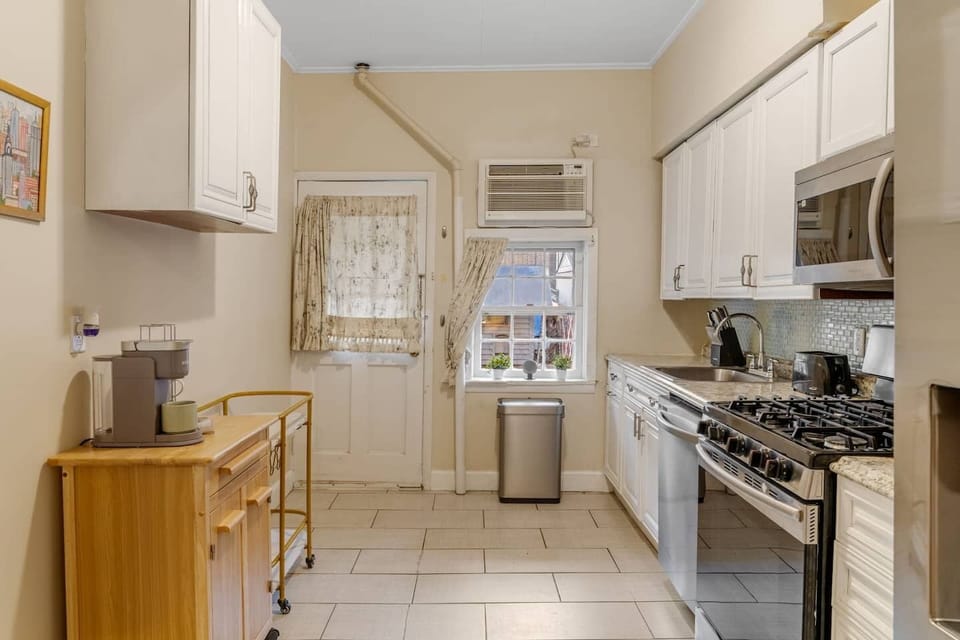 A fully equipped kitchen with stainless steel appliances, plenty of counter space, and everything you need for home-cooked meals.