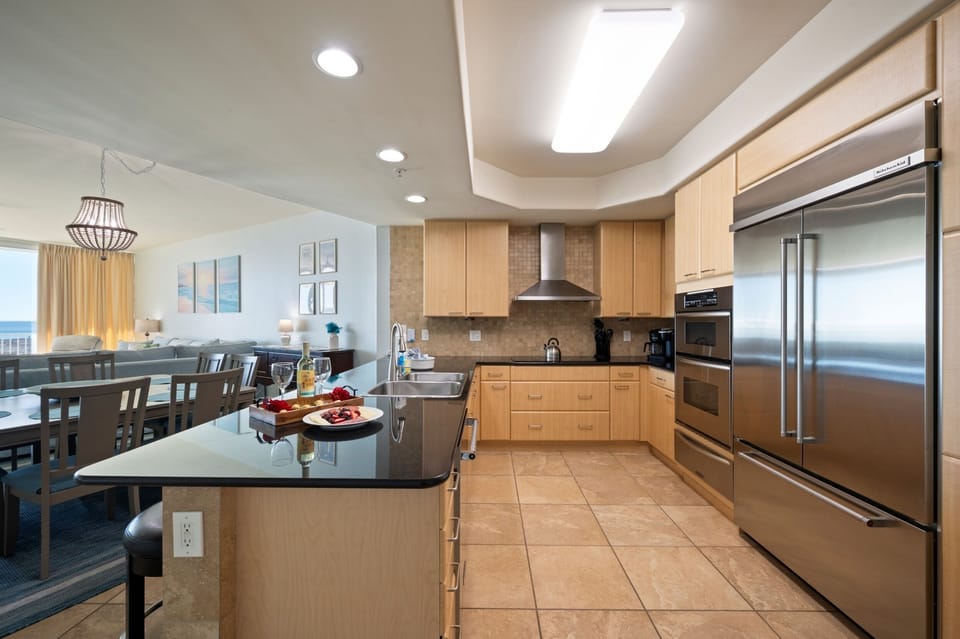 Full stocked kitchen with stainless steel appliances