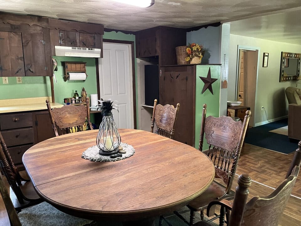 Experience the perfect blend of style and functionality in this dine-in kitchen, seamlessly integrated with the open floor plan of the living area. This thoughtfully designed space comes equipped with a convenient small refrigerator, a convection microwav