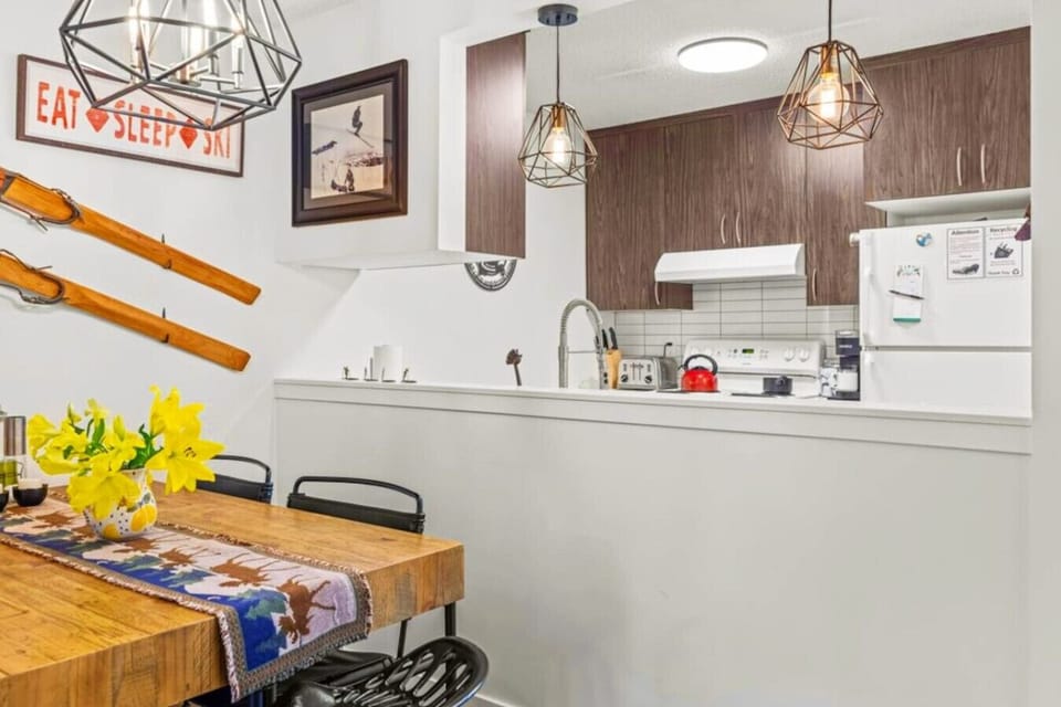 The compact, yet functional kitchen is perfect for hassle-free meal preparation.