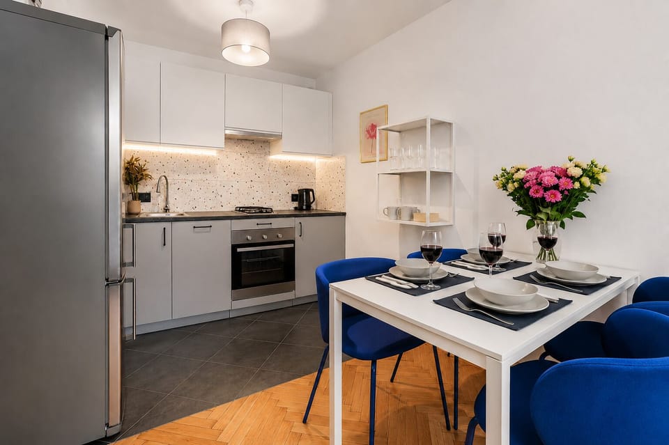 Deluxe Apartment, Non Smoking | Private kitchen | Electric kettle, dining tables