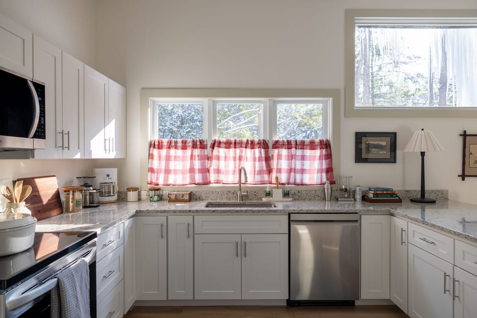 Modern kitchen with ample counter space, perfect for group meals