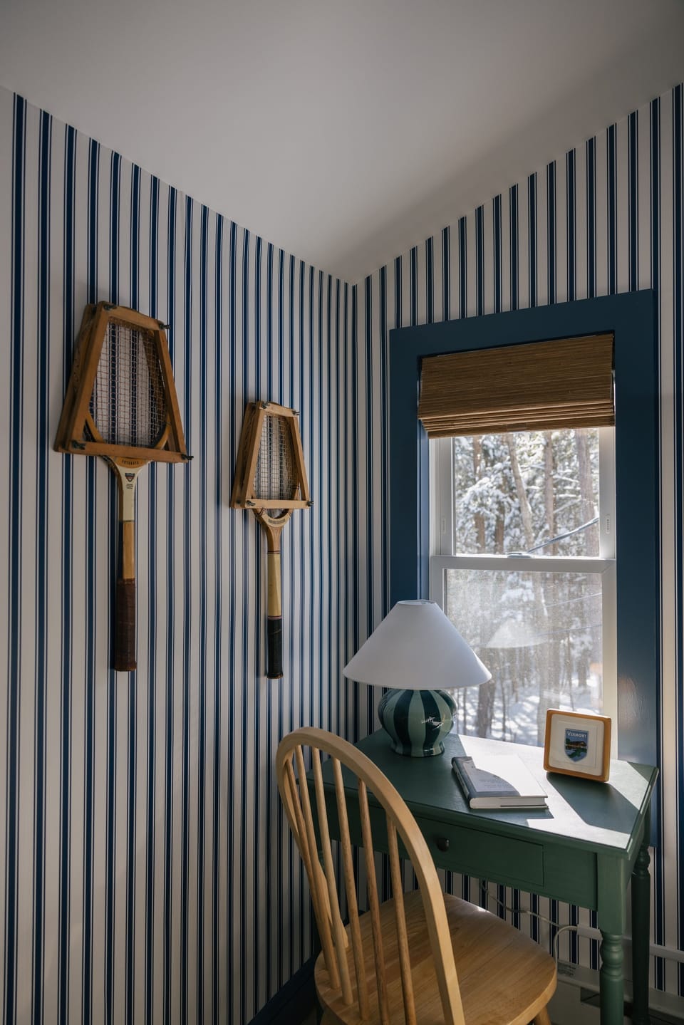 Peaceful workspace nook with desk and serene woodland views