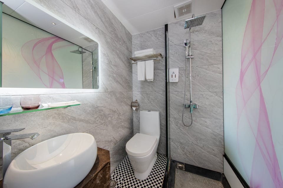Luxury Twin Room, City View | Bathroom | Shower, hair dryer, towels, soap
