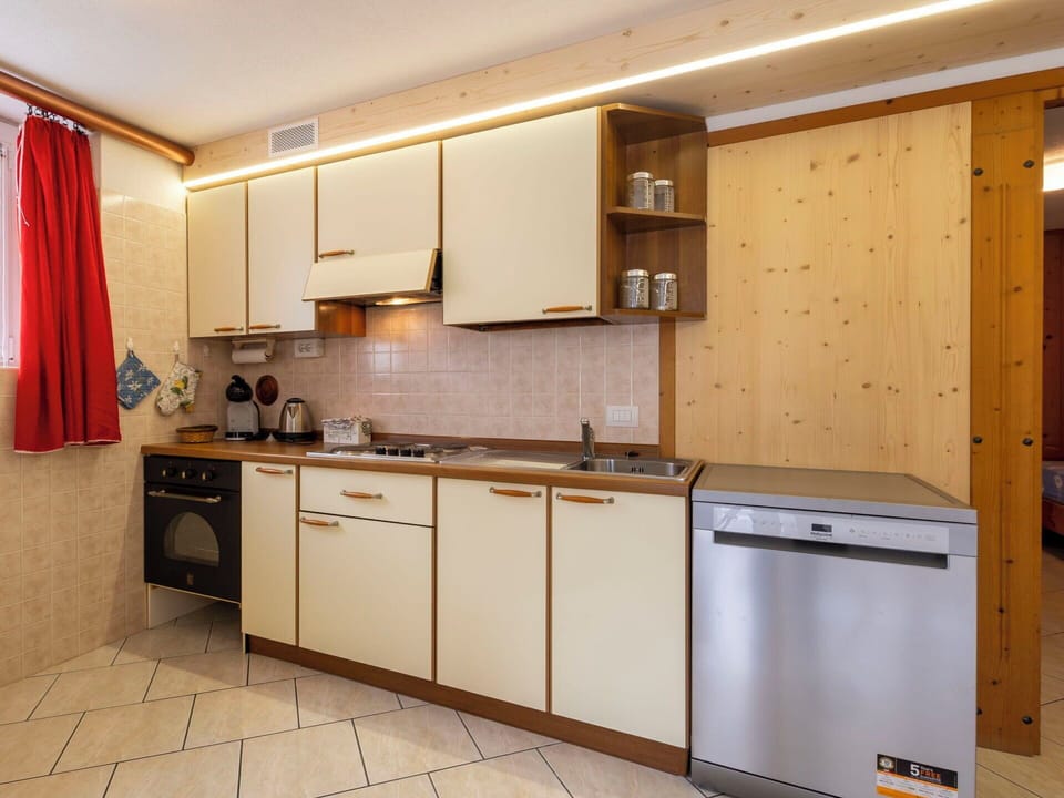 Wood, Interior Design, Flooring, Ceiling, Kitchen, Floor, Room, Countertop, Furniture, Major Appliance