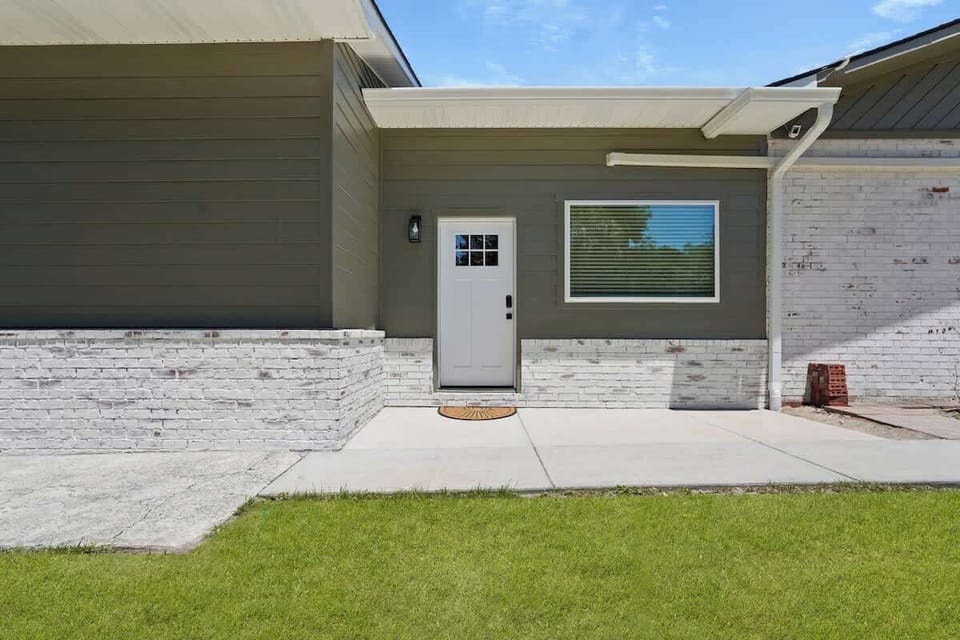 Property overview showing garage and studio entrance. The studio is accessed via the side entrance near the right side of the garage.