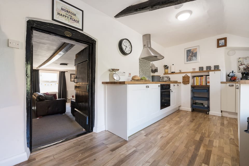 kitchen with doorway into the sitting room