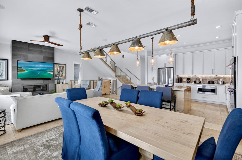2nd Floor - Dining area designed for gathering, offering comfortable seating and an inviting space for family meals, group dinners, and celebrating special moments together during your beach getaway.
