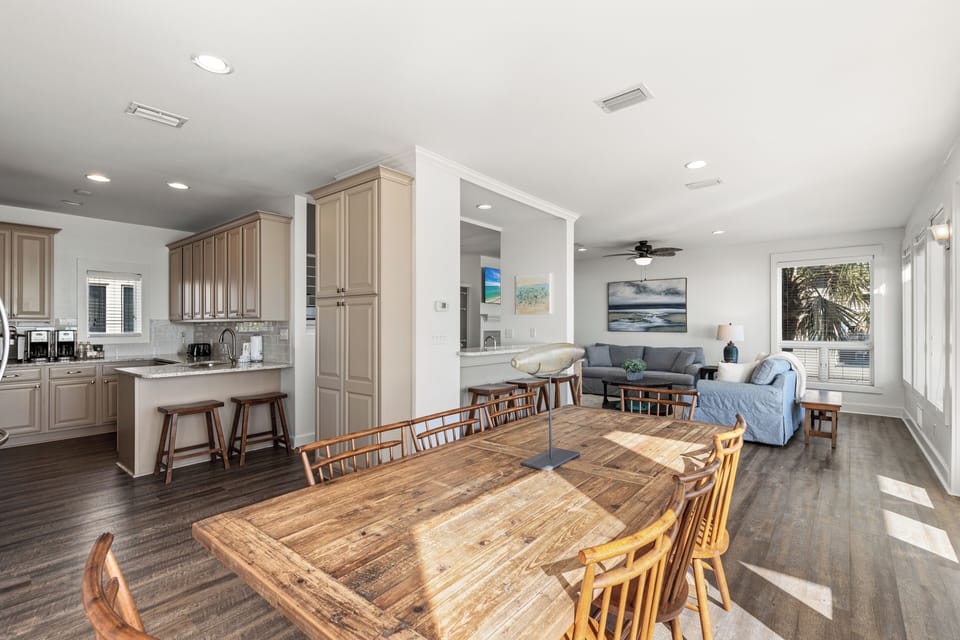 Your open-concept living space flows beautifully from kitchen to dining to lounge, creating the perfect gathering spot for memorable vacation moments together.
