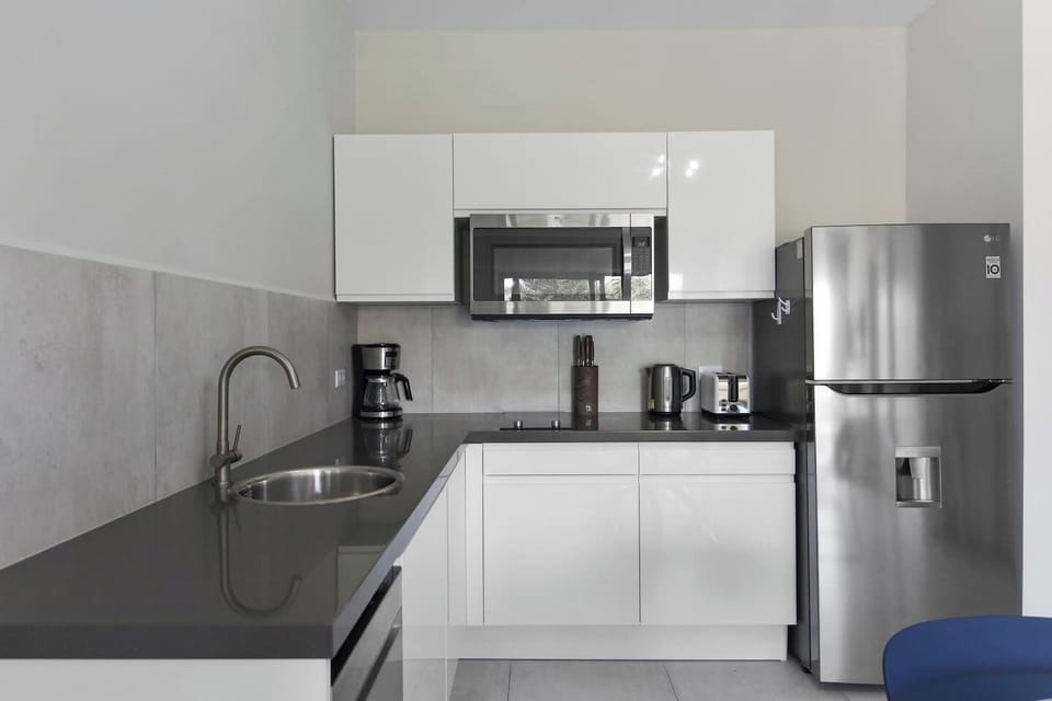 Enjoy preparing your favorite meals in this spacious modern kitchen