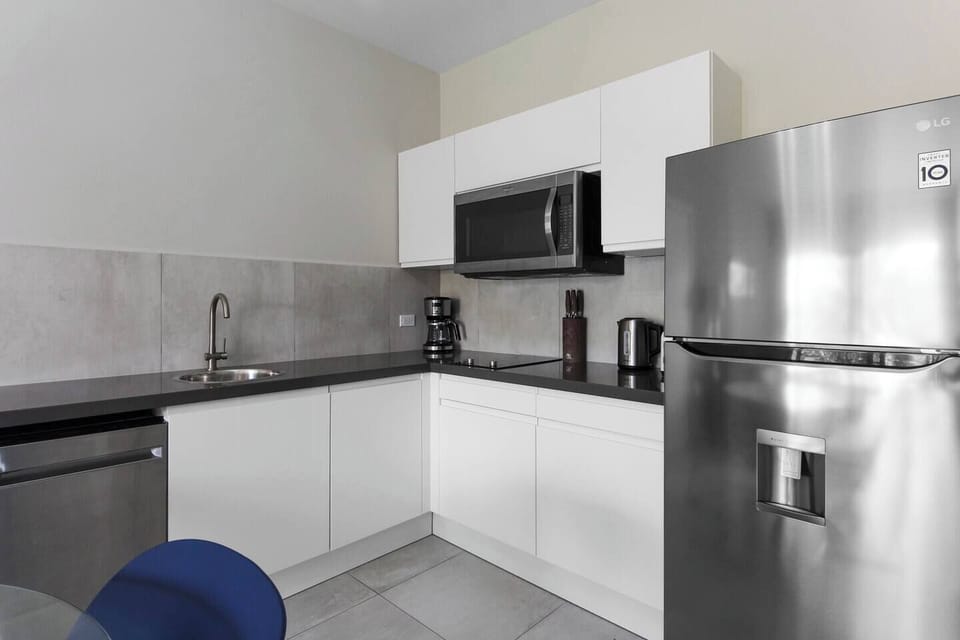 Enjoy preparing your favorite meals in this spacious modern kitchen