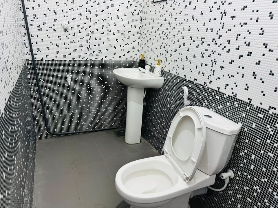 Superior Condo, Balcony, City View | Bathroom | Slippers, bidet, soap, shampoo