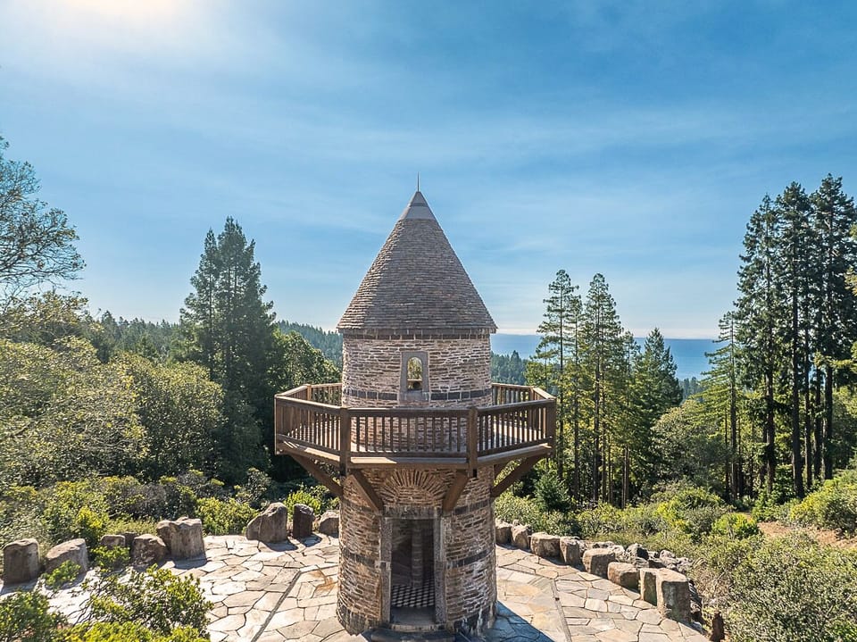 A one-of-a-kind stone tower nestled among the trees