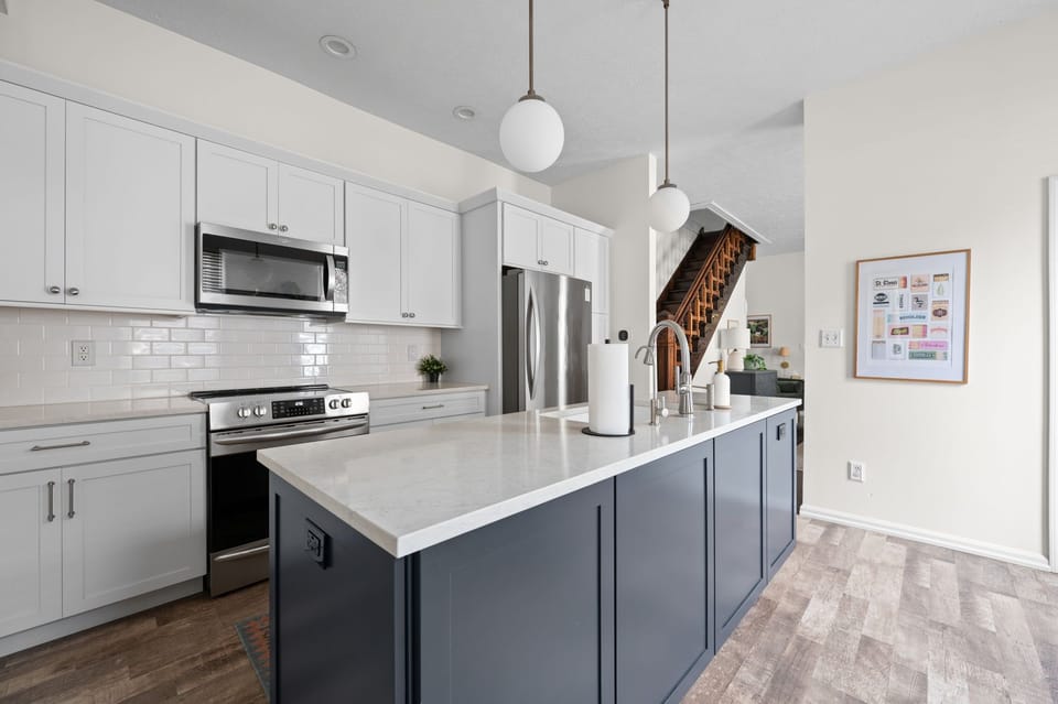 Enjoy cooking, morning coffee, or gathering for a drink in the fully stocked kitchen.