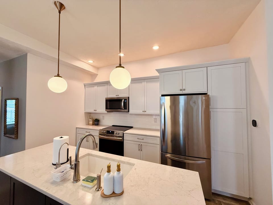 Your home away from home comes with a fully equipped kitchen.