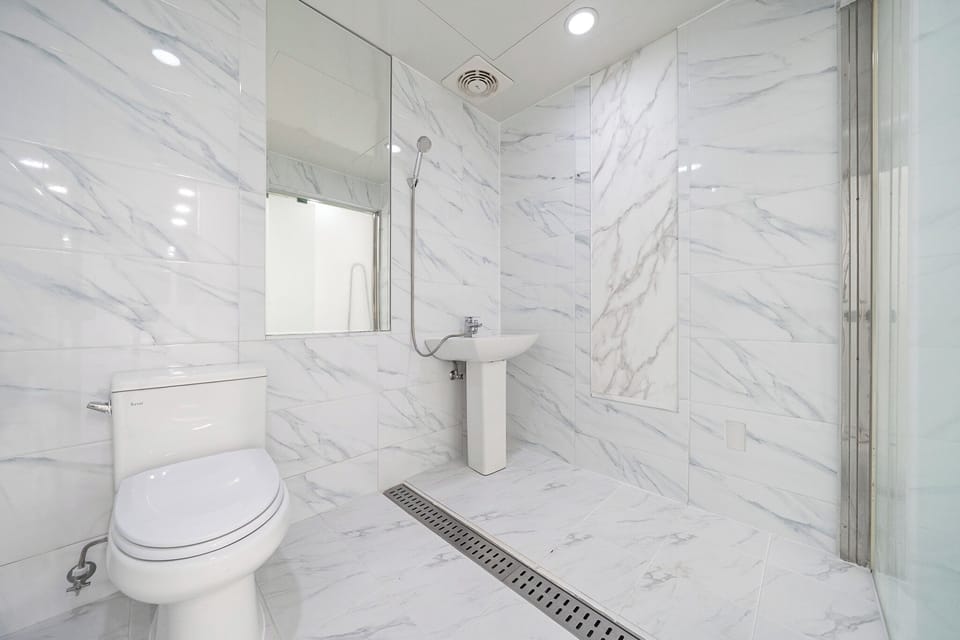 Hair dryer, slippers, towels, soap