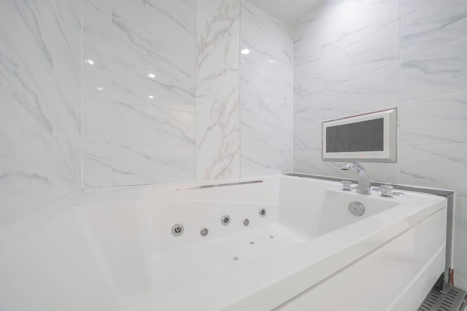 Hair dryer, slippers, towels, soap