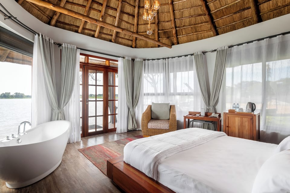 Executive Cottage, 1 King Bed, Lake View | In-room safe, soundproofing, free WiFi, wheelchair access