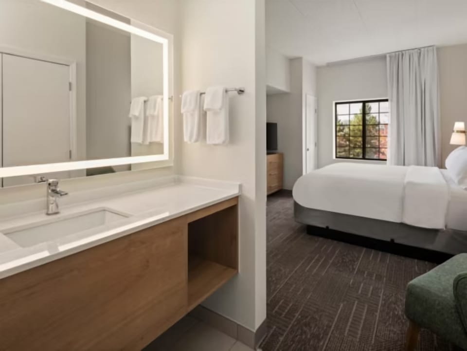 Refresh each morning with a bright vanity and plush towels.