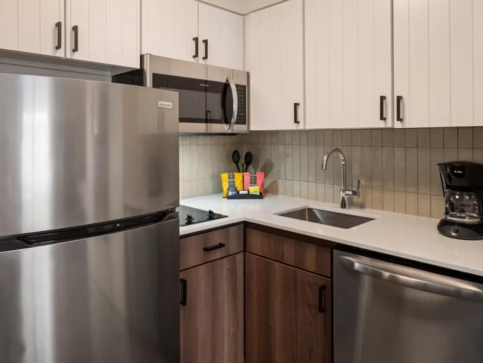 Settle in with an easy kitchenette for snacks and mornings.