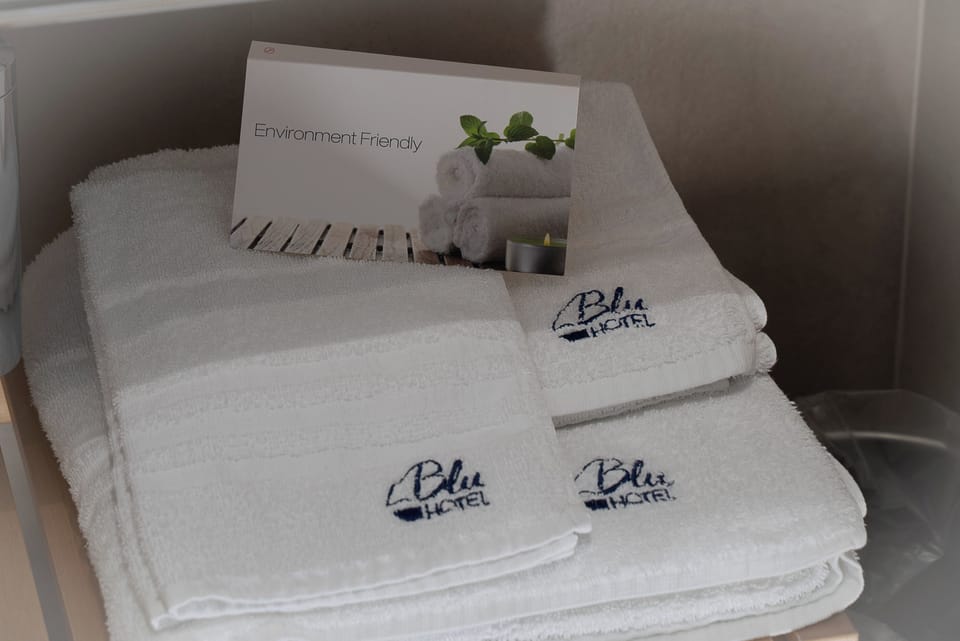 Shower, free toiletries, hair dryer, slippers