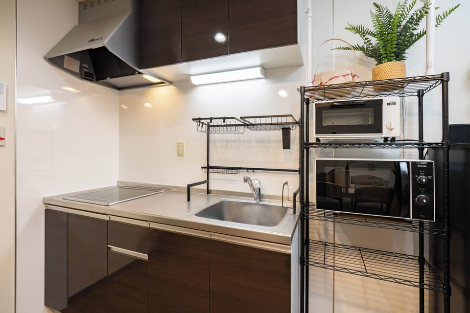 Deluxe House, Balcony | Private kitchen