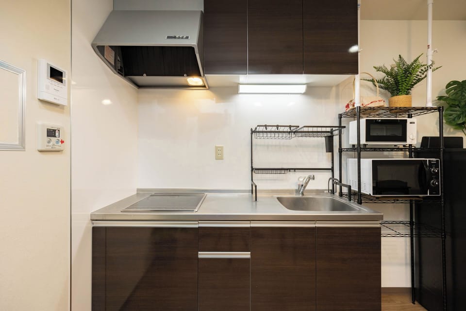 Deluxe House, Balcony | Private kitchen