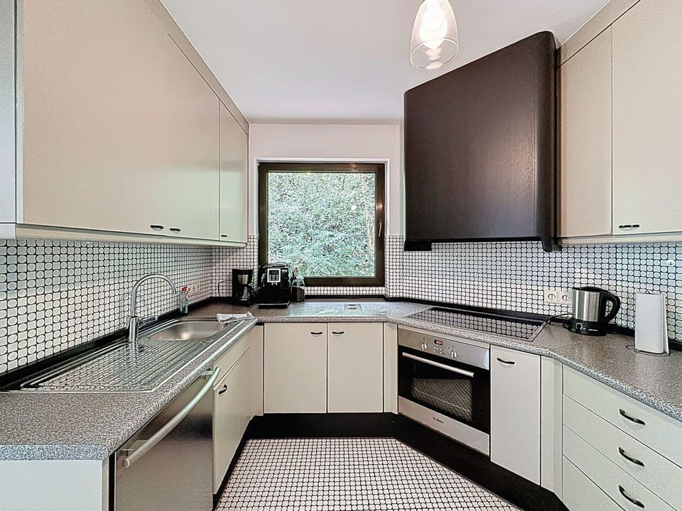 Kitchen, Countertop, Kitchen Appliance, Interior Design, Cabinetry, Flooring, Major Appliance, Floor, Home, Ceiling