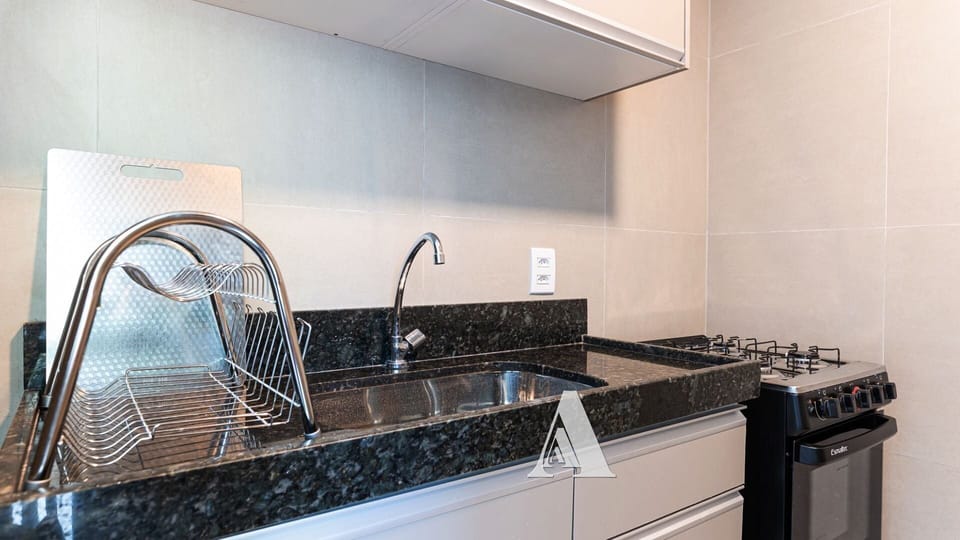 Comfort Apartment | Private kitchen | Blender, cookware/dishes/utensils, dining tables